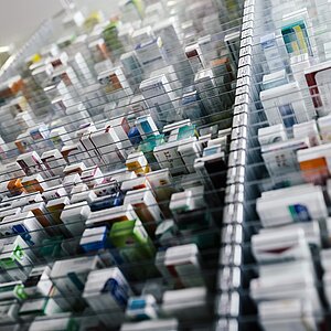 Medicine in shelves in commissioning machine in pharmacy